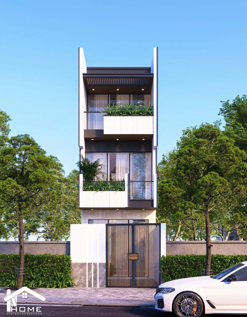 🌈NHÀ PHỐ HIỆN ĐẠI – KHẲNG ĐỊNH PHONG CÁCH SỐNG ! Thiết kế nhà phố 3 tầng mang đậm phong cách hiện đại – tinh tế – tối giản, là lựa chọn lý tưởng cho những ai yêu thích sự trẻ trung , năng động . 🔹 Điểm nhấn thiết kế: • Mặt tiền được xử lý mảng khối mạnh mẽ, kết hợp gam màu trắng – ghi xám sang trọng. • Ban công xanh mát với hệ cây tiểu cảnh giúp ngôi nhà gần gũi thiên nhiên. • Cửa kính lớn tối ưu ánh sáng tự nhiên, tạo cảm giác thông thoáng. • Hệ thống đèn led âm trần tinh tế, mang lại vẻ đẹp nổi bật cả ngày lẫn đêm. • Cổng sắt nan dọc hiện đại, vừa đảm bảo an ninh, vừa tạo điểm nhấn kiến trúc. 🔹 Phong cách sống hiện đại: Mỗi chi tiết trong thiết kế đều hướng đến sự tiện nghi và tinh giản, phù hợp với nhu cầu sinh hoạt của gia đình trẻ. Không gian mở, kết hợp cây xanh tạo nên sự cân bằng,